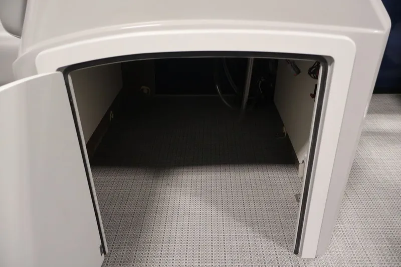 Slide: The Image of Open storage compartment on a 2026 Bentley Pontoons 200 LE CW boat. - 15