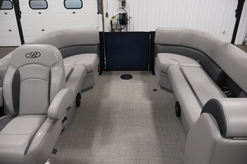 Slide: The Image of 2026 Bentley Pontoons 200 LE CW interior with gray seating and spacious layout. - 24