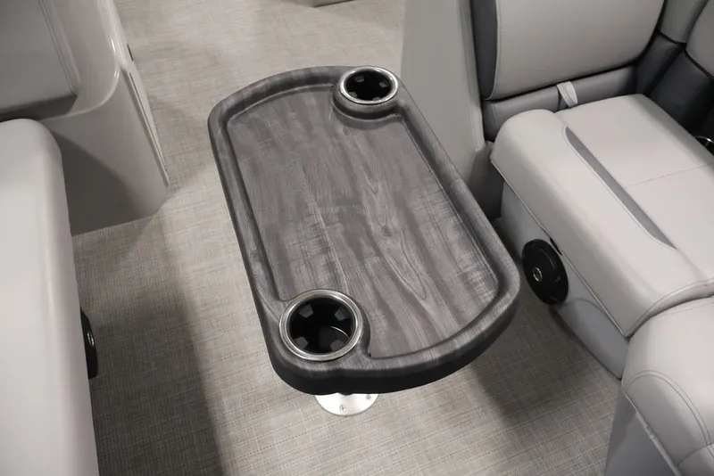 Slide: The Image of Interior of 2026 Bentley Pontoons 200 LE CW with sleek table and cup holders. - 21