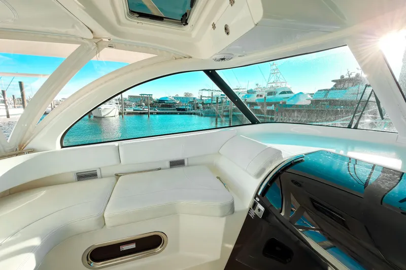 Slide: The Image of Luxurious interior of 2021 Pursuit OS 385 Offshore yacht with marina view. - 32