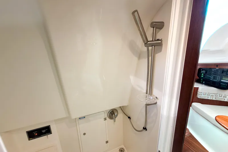 Slide: The Image of 2021 Pursuit OS 385 Offshore yacht bathroom with modern shower and sleek design. - 52