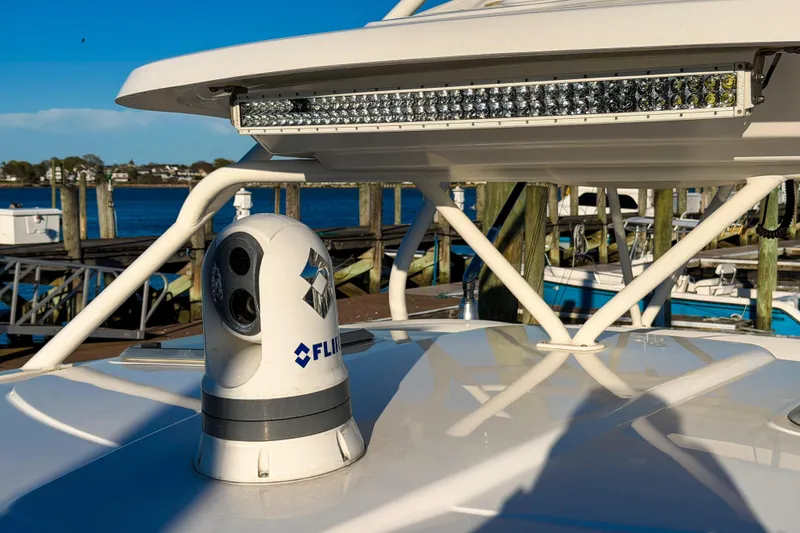 Slide: The Image of 2021 Pursuit OS 385 Offshore boat with FLIR camera and LED light bar. - 66