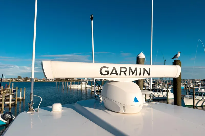 Slide: The Image of Garmin radar on 2021 Pursuit OS 385 Offshore boat at marina. - 67