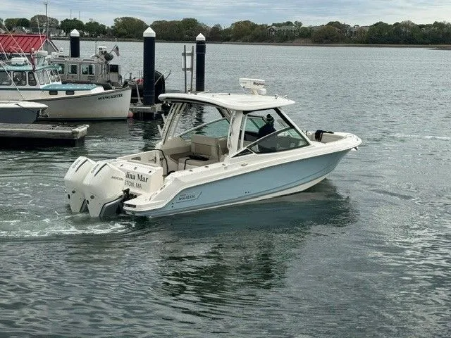 Slide: The Image of 2022 Boston Whaler 280 Vantage boat on calm water. - 0