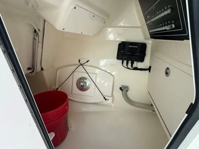 Slide: The Image of Interior of 2022 Boston Whaler 280 Vantage with red bucket. - 21