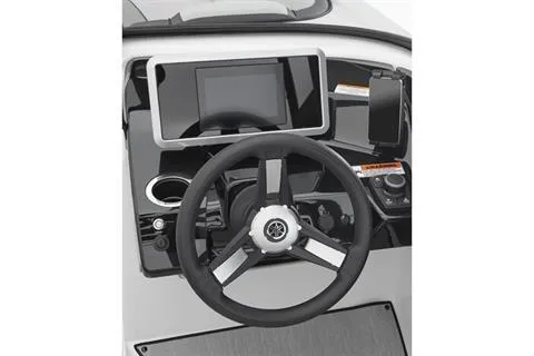 Slide: The Image of 2025 Yamaha Boats AR250 dashboard with steering wheel and touchscreen display. - 3