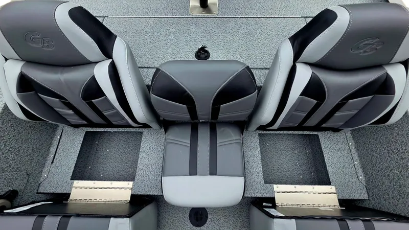 Slide: The Image of Interior of G3 Sportsman 1910 boat, gray and black seats, year 2026. - 14