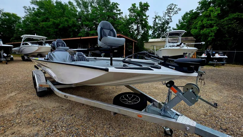 Slide: The Image of 2026 G3 Sportsman 1910 boat on trailer outdoors. - 2