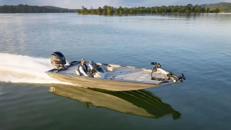 Slide: The Image of 2026 G3 Sportsman 1910 boat on calm water. - 28