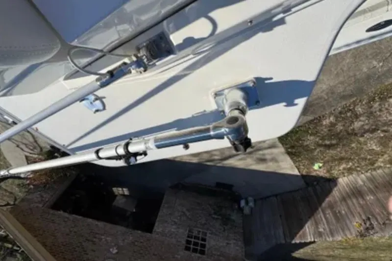 Slide: The Image of 2019 SeaVee 320B boat detail showing fishing rod holder and deck equipment. - 19