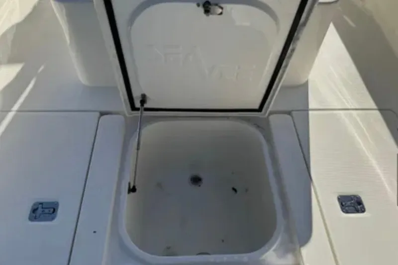 Slide: The Image of Open storage compartment on 2019 SeaVee 320B boat deck. - 21
