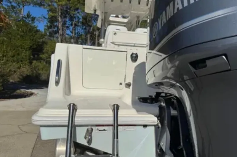 Slide: The Image of 2019 SeaVee 320B boat with Yamaha engine, rear view showing swim platform and ladder. - 4