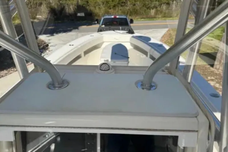 Slide: The Image of 2019 SeaVee 320B boat on trailer, viewed from above, with truck in background. - 7