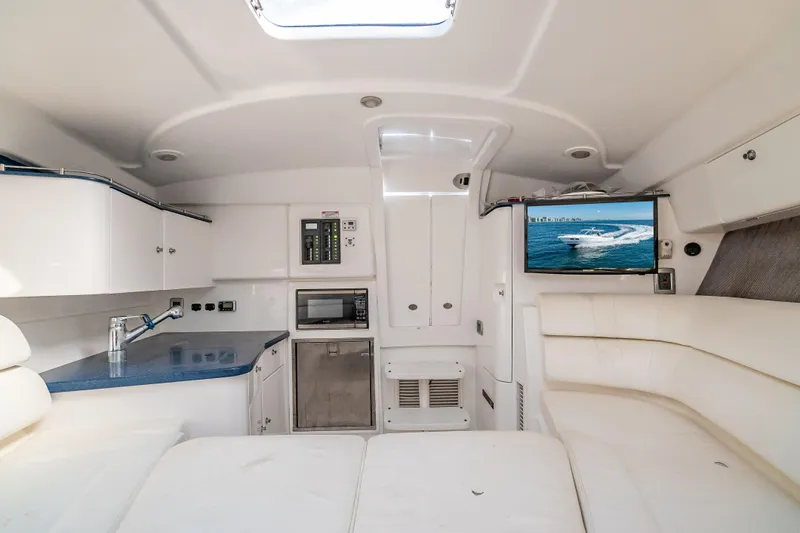 Slide: The Image of Luxurious interior of a 2016 Intrepid 375 Center Console boat with modern amenities. - 26