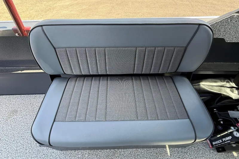 Slide: The Image of Gray cushioned seat in 2026 Alumaweld Intruder 22 boat interior. - 12