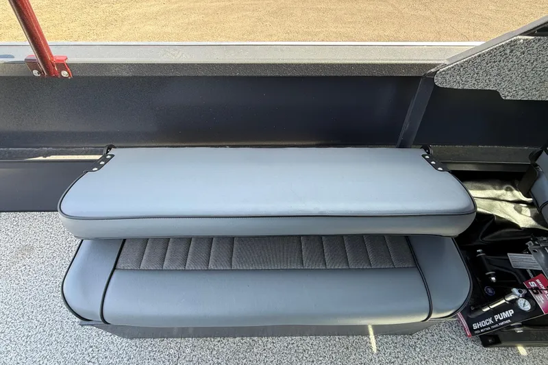 Slide: The Image of 2026 Alumaweld Intruder 22 boat seat with gray upholstery and shock pump. - 13