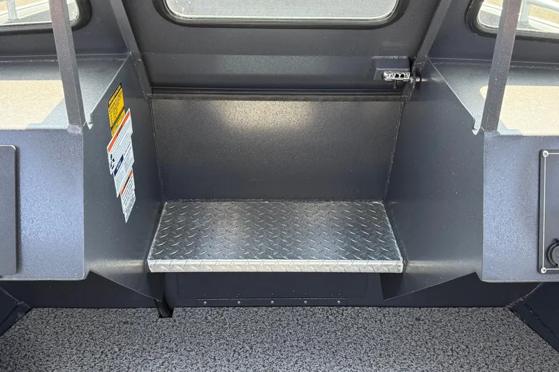 Slide: The Image of Interior of 2026 Alumaweld Intruder 22 boat with diamond plate step. - 15