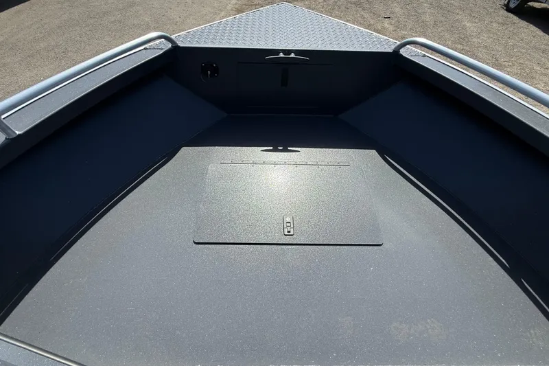 Slide: The Image of Bow area of 2026 Alumaweld Intruder 22 boat with storage compartment. - 22
