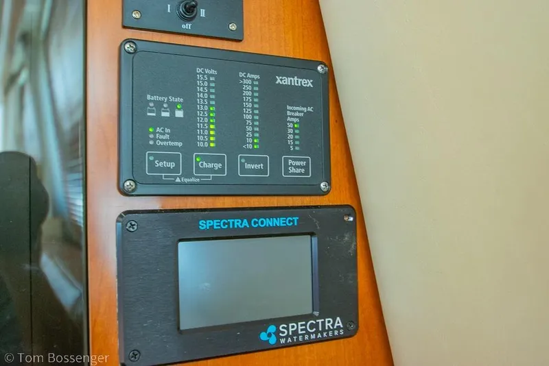 Slide: The Image of Control panel on 2005 Sea Ray 420 Sedan Bridge, featuring Xantrex and Spectra Watermakers systems. - 32