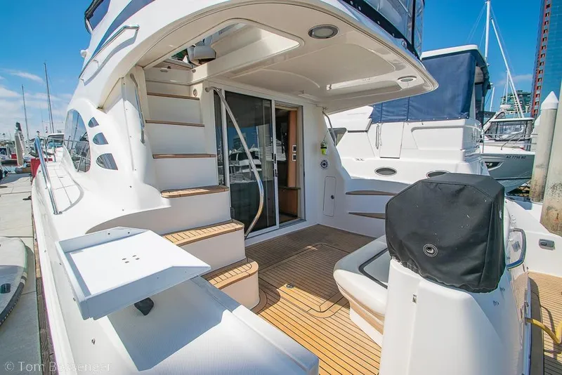 Slide: The Image of 2005 Sea Ray 420 Sedan Bridge yacht with spacious deck and elegant design. - 4