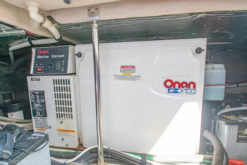 Slide: The Image of Onan marine generator in 2005 Sea Ray 420 Sedan Bridge engine room. - 59
