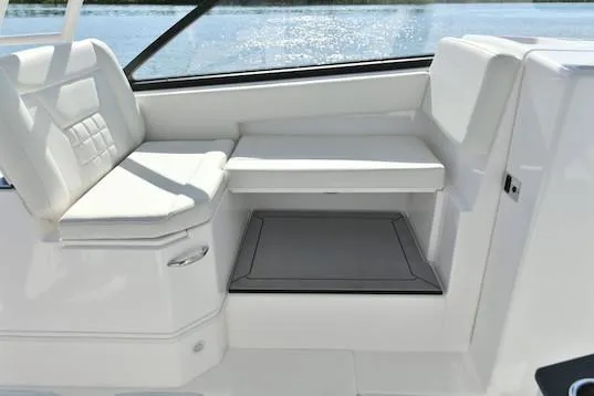 Slide: The Image of Manufacturer Provided Image: 2019 Everglades 340 Dual Console boat interior seating area. - 14