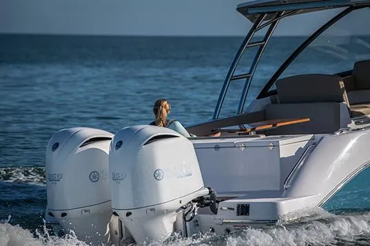 Slide: The Image of Manufacturer Provided Image: 2019 Everglades 340 Dual Console boat cruising on the ocean. - 8