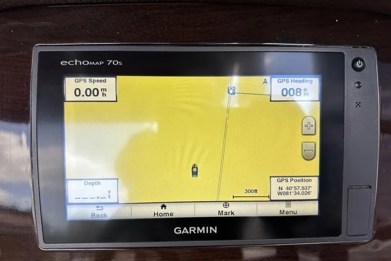 Slide: The Image of Garmin GPS display on 2015 Chaparral 257 SSX boat showing navigation details. - 14