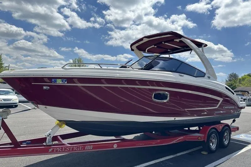 Slide: The Image of 2015 Chaparral 257 SSX boat on trailer under blue sky with clouds. - 39