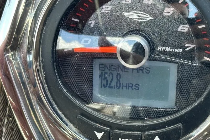 Slide: The Image of Close-up of Chaparral 257 SSX 2015 engine hour meter showing 152.8 hours. - 4