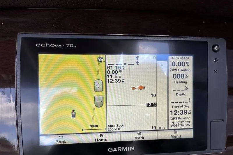 Slide: The Image of Garmin echoMAP 70s displaying navigation and fishfinder data on a 2015 Chaparral 257 SSX. - 8