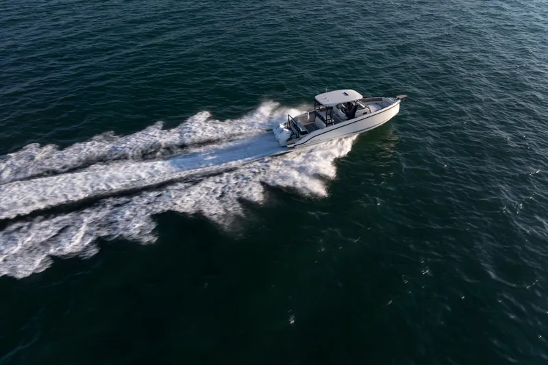 Slide: The Image of Navan T30 boat 2027 speeding across the ocean. - 13