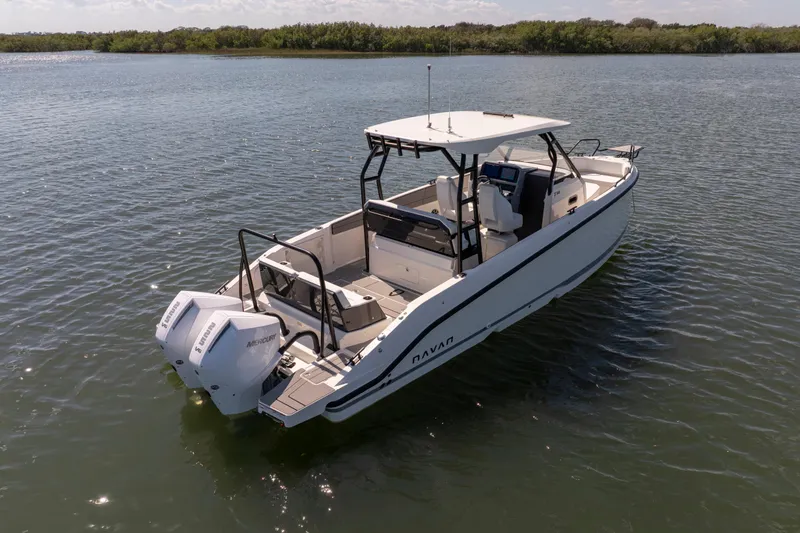 Slide: The Image of 2027 Navan T30 boat on calm water, featuring dual Mercury outboard engines. - 3