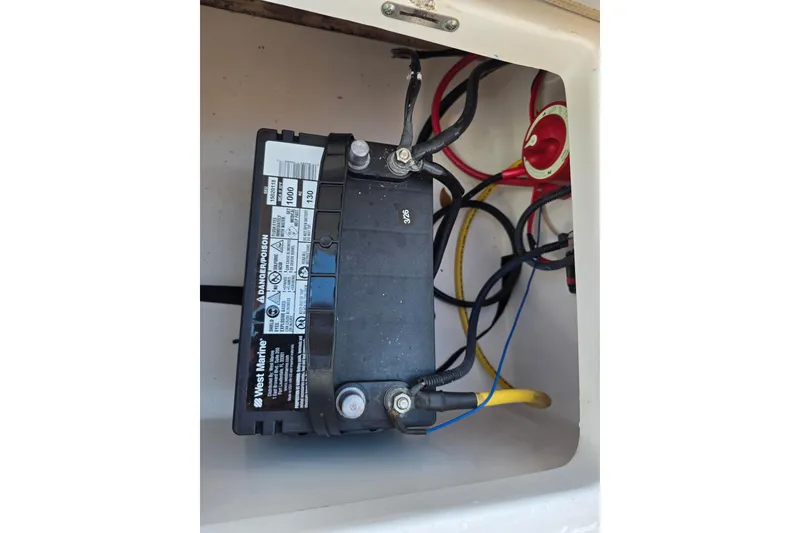 Slide: The Image of Marine battery installation in a 2018 Tidewater 1910 Bay Max boat. - 14