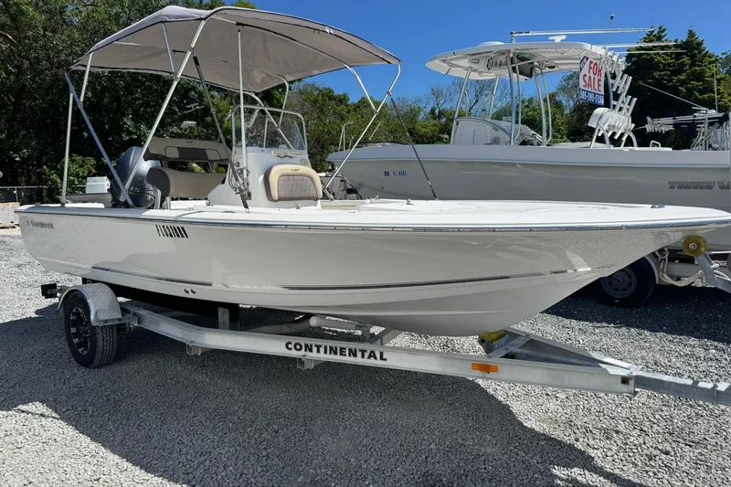 Slide: The Image of 2018 Tidewater 1910 Bay Max boat on trailer, displayed outdoors for sale. - 16