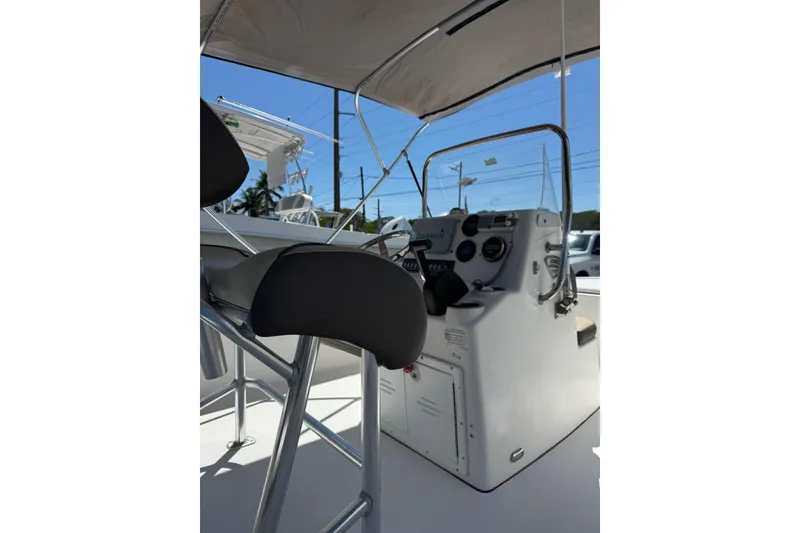 Slide: The Image of 2018 Tidewater 1910 Bay Max boat interior with steering console and seating. - 6