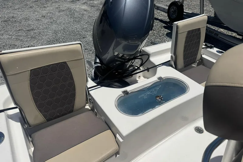 Slide: The Image of 2018 Tidewater 1910 Bay Max boat interior with Yamaha 115 engine and seating. - 9
