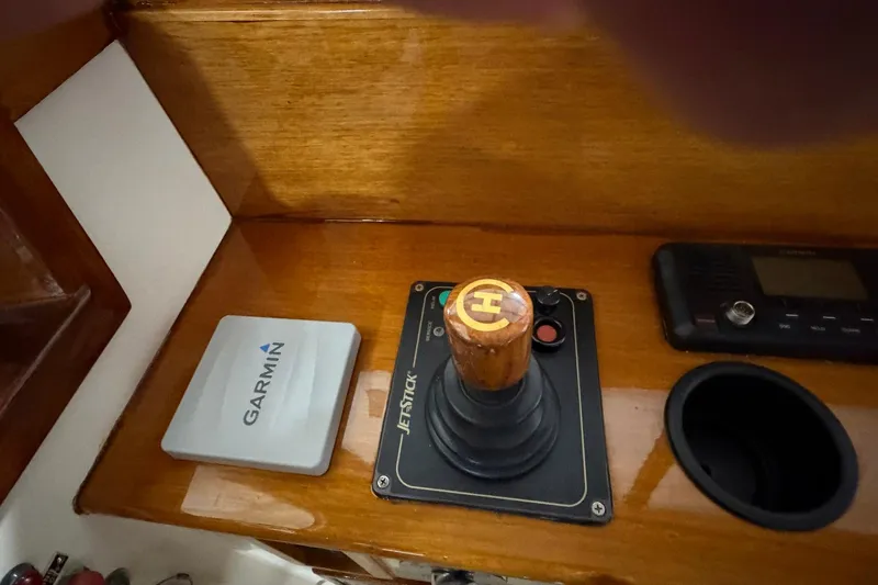 Slide: The Image of Hinckley Picnic Boat 36 EP 2003 cockpit with Garmin device and joystick control. - 4