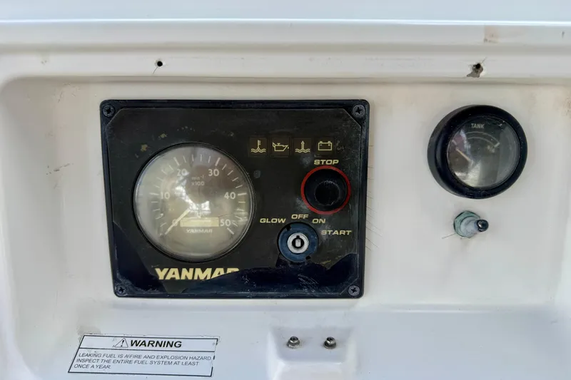 Slide: The Image of Yanmar engine control panel on 2004 Jeanneau Sun Odyssey 35 sailboat. - 14