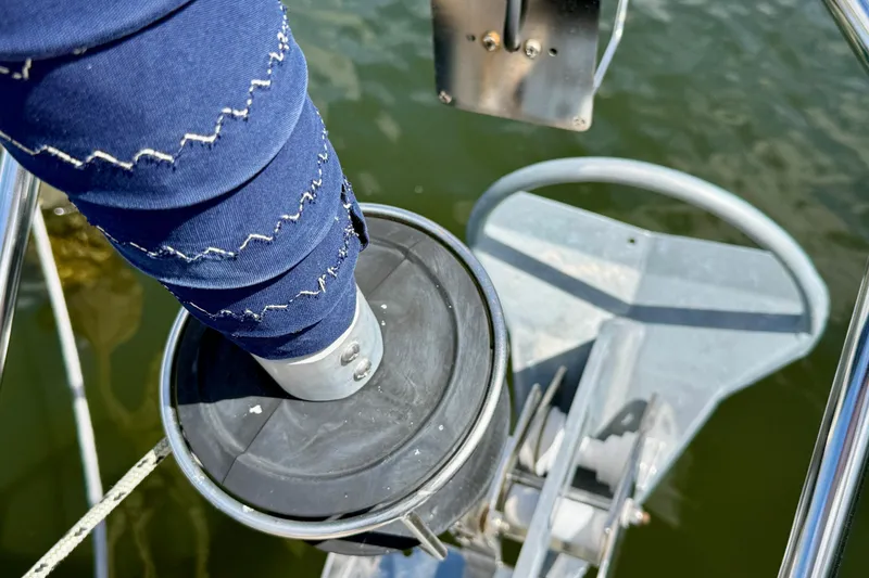 Slide: The Image of Close-up of Jeanneau Sun Odyssey 35 sailboat's furling system, 2004 model, with blue sail cover. - 31