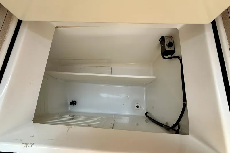 Slide: The Image of Empty storage compartment in 2004 Jeanneau Sun Odyssey 35 sailboat. - 50