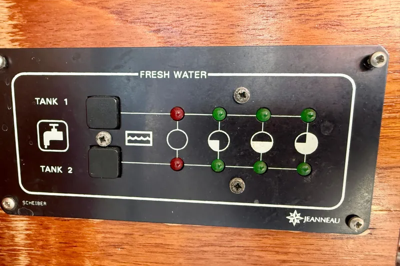 Slide: The Image of Control panel for fresh water tanks on a 2004 Jeanneau Sun Odyssey 35 sailboat. - 52