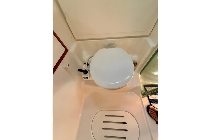 Slide: The Image of Toilet area in 2004 Jeanneau Sun Odyssey 35 sailboat bathroom. - 60