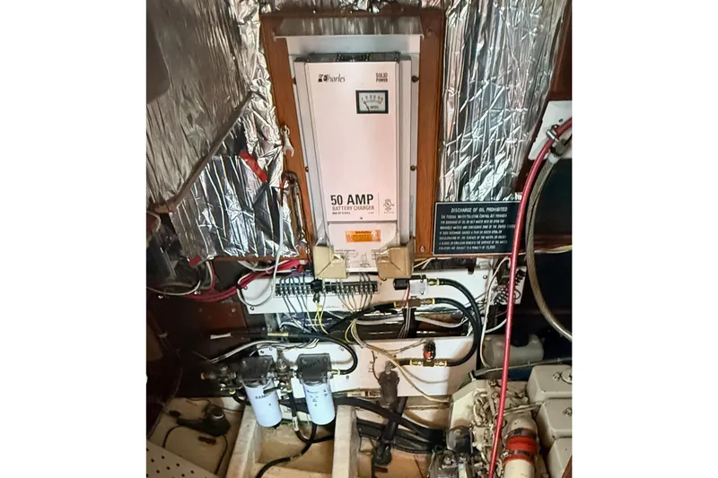 Slide: The Image of Engine room of 1987 Lord Nelson Victory Tug with battery charger and wiring. - 45