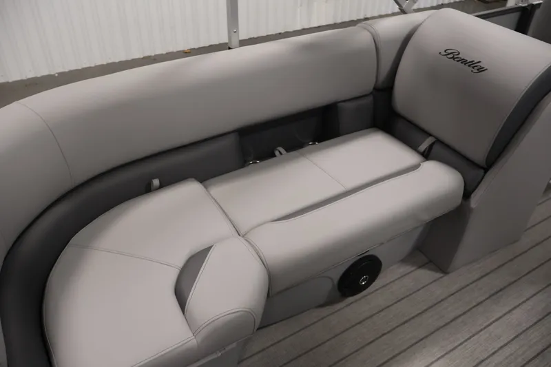 Slide: The Image of 2026 Bentley Pontoons 220 Navigator interior seating with elegant gray upholstery. - 32