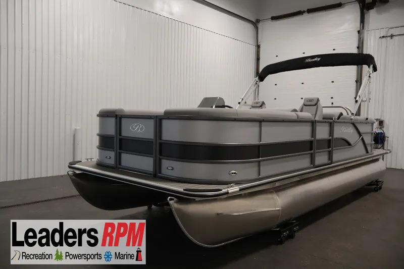 The Image of 2026 Bentley Pontoons 220 Navigator in showroom, Leaders RPM logo visible. - 3