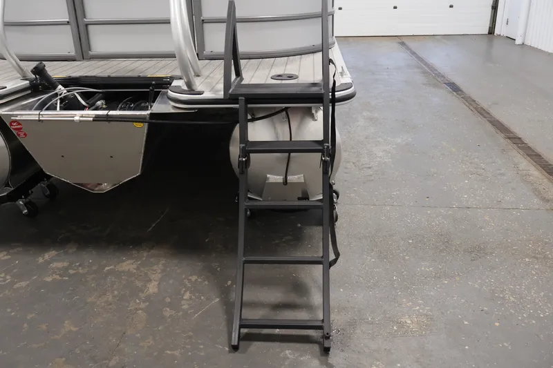 Slide: The Image of Rear view of 2026 Bentley Pontoons 220 Navigator with ladder and deck details. - 39