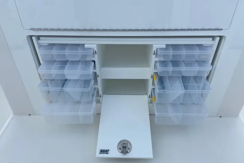 Slide: The Image of Fishing tackle storage compartments on a 2026 Regulator 28 boat. - 8