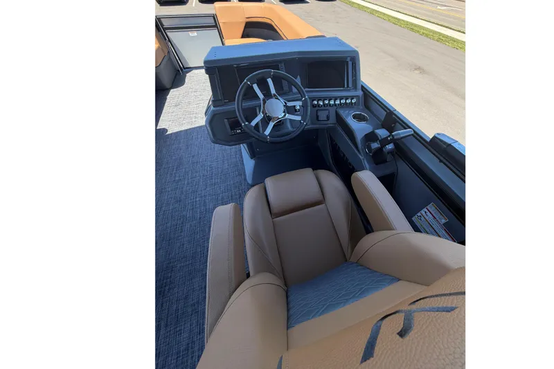 Slide: The Image of Interior of Custom V23 RLS 2026 with modern steering wheel and leather seats. - 18
