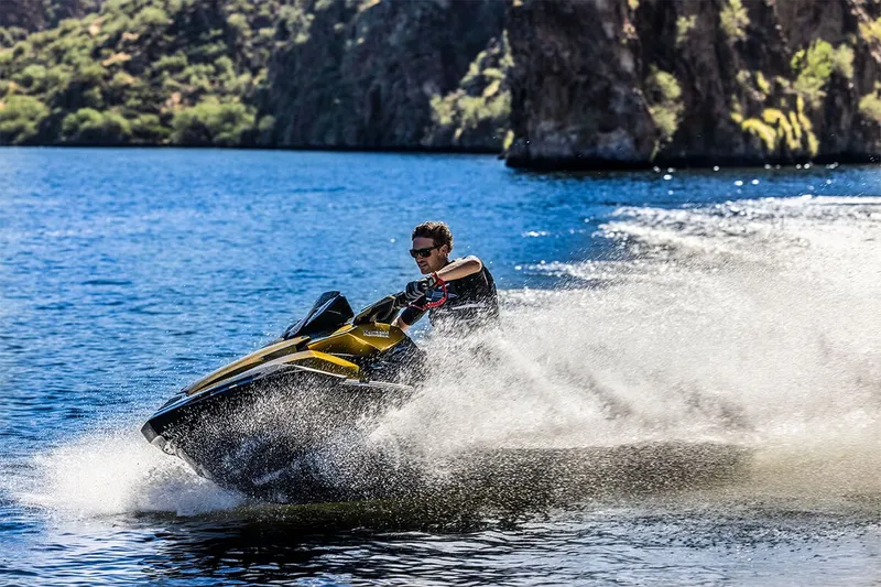 Slide: The Image of Man riding 2023 Kawasaki JET SKI ULTRA 160LX on a lake. - 10